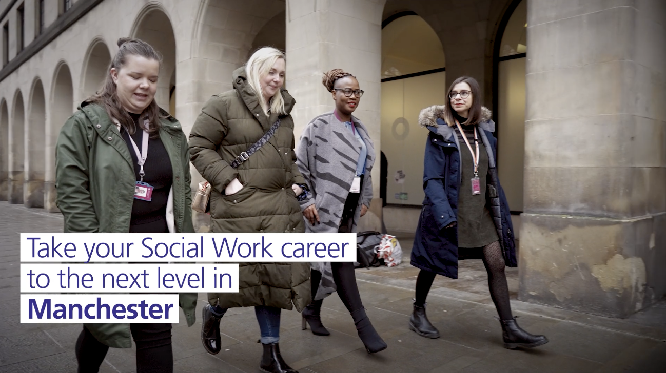 Image of four social workers walking through Manchester city centre